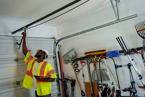 Professional Garage Door Panel Replacement technician working in Hayden, ID